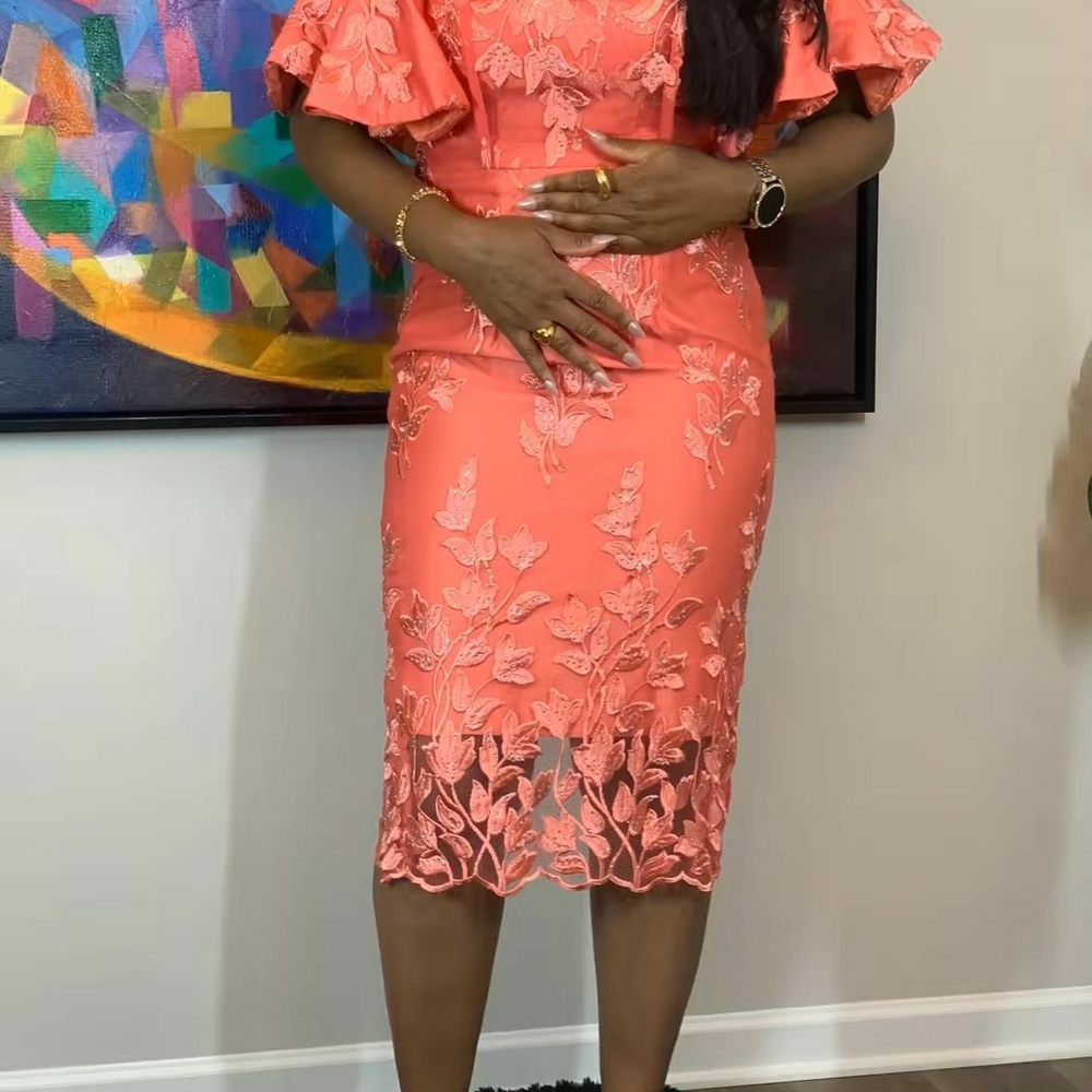 Nigerian Couture Coral Lace Dress with Floral Design